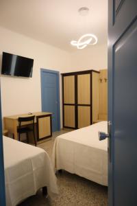 Postel nebo postele na pokoji v ubytování Casa Dalmazia