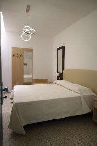 Postel nebo postele na pokoji v ubytování Casa Dalmazia