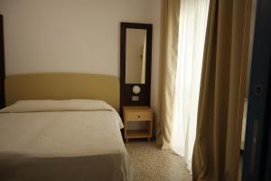 Postel nebo postele na pokoji v ubytování Casa Dalmazia