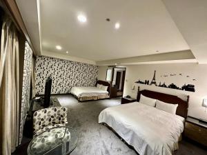 Postel nebo postele na pokoji v ubytování 喜客商旅 Seeker Hotel - Sanchong