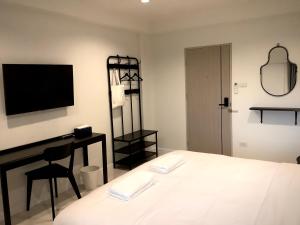 Letto o letti in una camera di IKKYU2 Angthong อิคคิว2