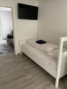 Giường trong phòng chung tại Ferienwohnung Monteurwohnungen Kassel Zentral lll