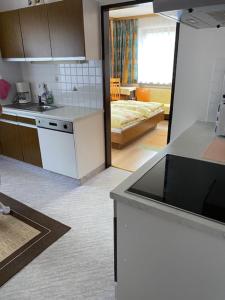 Łóżko lub łóżka w pokoju w obiekcie Gästehaus Hochwimmer
