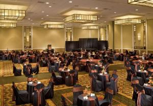 a banquet hall filled with tables and chairs at The Park Vista - A DoubleTree by Hilton Hotel - Gatlinburg in Gatlinburg