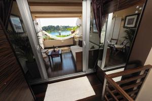 an aerial view of a living room with a balcony at Apartments Villa Markiz in Rovinj
