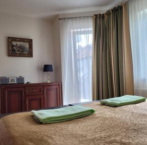 Ein Bett oder Betten in einem Zimmer der Unterkunft Chalet Villa REX