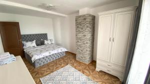 Postel nebo postele na pokoji v ubytování Casa Lac de Verde