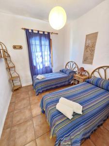 Ένα ή περισσότερα κρεβάτια σε δωμάτιο στο Precioso apartamento en primera línea de Mar