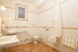 Koupelna v ubytování Fattoria La Principina Hotel & Congress