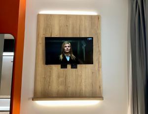 TV a/nebo společenská místnost v ubytování Hotel Leonessa
