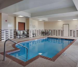 a large swimming pool in a hotel room at Hilton Garden Inn Jonesboro in Jonesboro