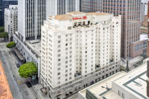 an aerial view of a building with a hilton sign on it at Hilton Checkers Los Angeles in Los Angeles +45 photos