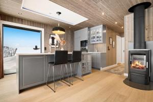 Ett kök eller pentry på New lovely cabin in Rauland, ski inout, fast wifi