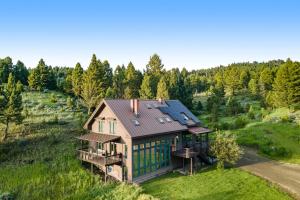 an overhead view of a house with a roof at Hidden Hollow in Bozeman