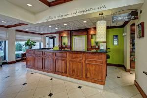 a lobby with a large counter in a store at Hilton Garden Inn Memphis/Southaven in Southhaven