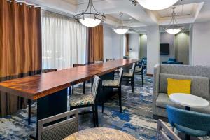 a conference room with a long table and chairs at Hampton Inn & Suites Country Club Plaza in Kansas City