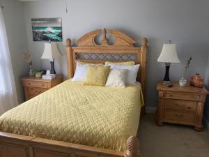 a bedroom with a large bed and two night stands at Casa Cool in Braselton