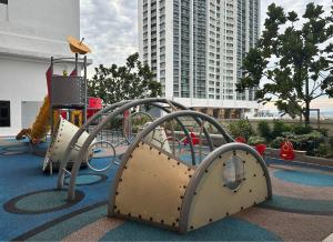 an outdoor playground with a slide and a slide at Fiifo TenKinrara-Pavillion-IOI Mall-SunwayPyramid in Puchong
