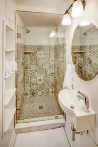 a bathroom with a shower and a sink at Fairytale Loft Suite 1 bed, 1 bath Luxury Apartment in Downtown Belmont in Charlottesville