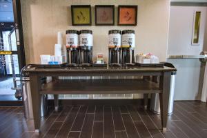 a table with several bottles on top of it at Hampton Inn Oklahoma City/Yukon in Yukon