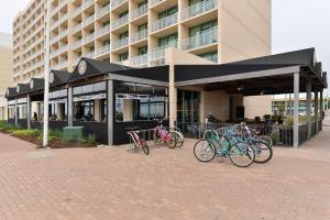 a group of bikes parked in front of a building at Hampton Inn Virginia Beach-Oceanfront South in Virginia Beach