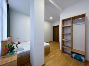 Postel nebo postele na pokoji v ubytování Hotel mia Telavi