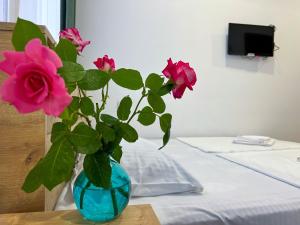 Postel nebo postele na pokoji v ubytování Hotel mia Telavi