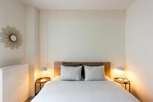 Łóżko lub łóżka w pokoju w obiekcie apartamenty-wroc Atal Towers