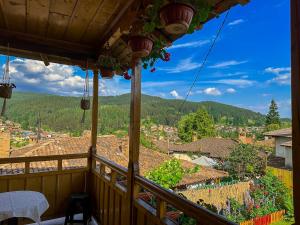 a view from the balcony of a house at Златкова къща in Koprivshtitsa