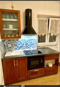 A kitchen or kitchenette at Oasi Felice