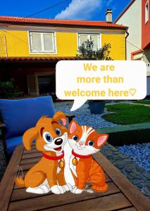 a cartoon of two fox characters standing in front of a house at Kvarner holiday home in Jadranovo