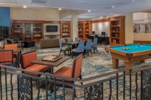 a hotel lobby with a pool table and chairs at DoubleTree by Hilton Sonoma Wine Country in Rohnert Park