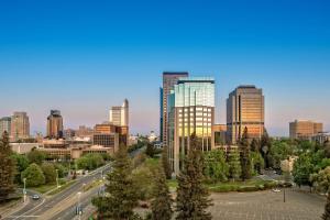 a view of a city skyline with tall buildings at Embassy Suites by Hilton Sacramento Riverfront Promenade in Sacramento