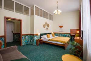 Posteľ alebo postele v izbe v ubytovaní Hotel Arcus Garden