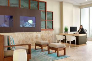TV a/nebo společenská místnost v ubytování Embassy Suites by Hilton San Juan - Hotel & Casino