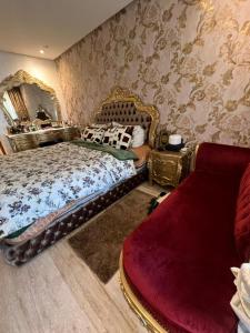 Кровать или кровати в номере Tamaris (Dar bouaaza)