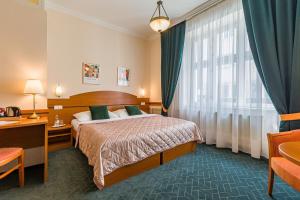 Posteľ alebo postele v izbe v ubytovaní Hotel Arcus Garden