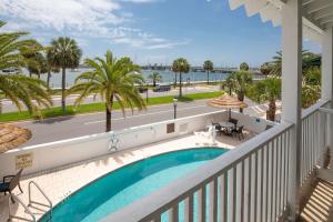 a view of the pool from the balcony of a resort at Hilton Saint Augustine Historic Bayfront in Saint Augustine