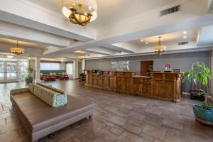 a lobby with a welcome sign and a waiting room at Hampton Inn Ukiah in Ukiah