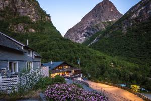 a house in the middle of a mountain at Briksdalsbre Fjellstove in Briksdalsbre