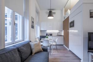 Et opholdsområde på Central Cozy Stay