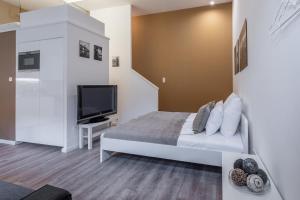 Et tv og/eller underholdning på Central Cozy Stay