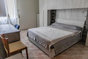 Postel nebo postele na pokoji v ubytování Terra di Mezzo