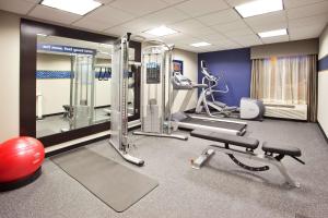 a gym with cardio equipment and a red exercise ball at Hampton Inn Atlanta-Town Center/Kennesaw in Kennesaw