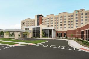 a rendering of the front of a hospital at Embassy Suites by Hilton Chicago Naperville in Naperville