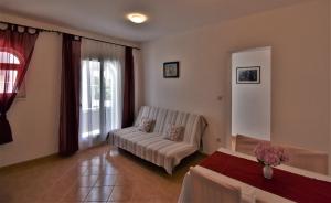Postel nebo postele na pokoji v ubytování Apartments Fabijanić