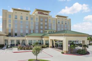 a rendering of the front of a hotel at Hilton Garden Inn San Antonio/Rim Pass Drive in San Antonio