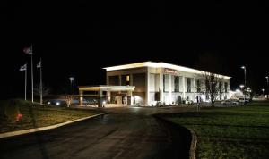 a large building at night with a street in front at Hampton Inn Summersville in Summersville
