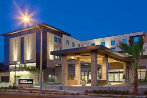 a building with a street light in front of it at Hilton Garden Inn Irvine/Orange County Airport in Irvine