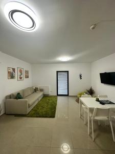 Posezení v ubytování Green Central Apartment